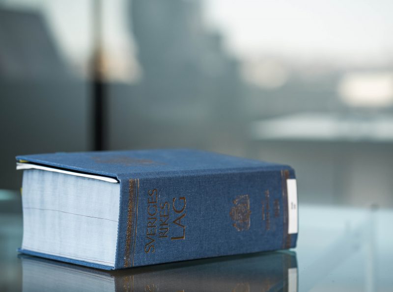 Law book on glass table